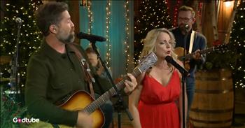 <p>It&rsquo;s time for some holiday cheer with a country twist! Watch this wonderful Christmas song from Josh Turner and Rhonda Vincent&rsquo;s duet performance of 'Joy to the World'.</p>

<p>The music kicks off immediately with a jolly melody and a lively band. There are multiple fiddles, guitars, and drums. You even see a young man who appears right behind Josh, joining in as part of the band. It is sweet watching the various ages come together and sing a song that has been passed down through the generations for many years.&nbsp;</p>

<p>As Josh sings, you will appreciate his rich, low voice. He radiates such clear happiness while performing. Suddenly, Rhonda jumps in with beautiful harmonies.&nbsp;</p>

<p>Her soprano voice complements his bass voice so well. The instrumental is super fun, and the beautifully lit Christmas trees in the background will put a smile on your face.</p>

<p>Rhonda is dressed in a stunning red dress and sings gorgeous harmonies. The young man on the piano shines on the final verse. We can glorify God as we sing along and listen to the music.&nbsp;</p>

<p>&ldquo;He rules the world with truth and grace,<br />
And makes the nations prove<br />
The glories of His righteousness,<br />
And wonders of His love.&rdquo;</p>

<p>As we celebrate the Christmas season and reflect on the love of our Savior Jesus, may this performance stir our hearts. Jesus, who is God, came to us as a baby from a virgin birth to be the Savior of the world.&nbsp;</p>

<p>He is the reason that we have joy. He is the reason that we have hope. As this band plays this classic hymn, join in and sing along, praising Jesus wherever you are today. We can thank Him for all the peace that we have in Him, which lasts forever.</p>

<p><em>&ldquo;But the angel said to them, &lsquo;Do not be afraid. I bring you good news that will cause great joy for all the people. Today in the town of David a Savior has been born to you; he is the Messiah, the Lord.'&rdquo; <strong><a href="https://www.godtube.com/bible/Galatians/2-20">Galatians 2:20</a></strong></em></p>
