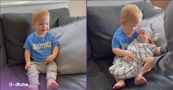 <p>A little boy holds his baby brother and steals hearts with his funny and sweet actions. What happens when the child is placed in his sibling&rsquo;s arms for the first time is almost too cute. Watch the short but heartwarming clip to see the precious and hilarious interaction between the two young siblings.</p>

<p>Having a sibling is a blessing, and those with brothers and sisters know this to be the case. Those are close, unbreakable bonds that last your entire life. In most cases, siblings are essentially lifelong friends, people you can always count on and turn to for any reason. What more could anyone ask for?</p>

<p>While siblings are great and a tremendous blessing, many, especially when they are children, do not always see it that way. Children do not always interact with one another in the most harmonious, kind and gentle way. Perhaps that less-than-perfect behavior has something to do with establishing and understanding those relationships and learning how they work. Or maybe it&rsquo;s something else entirely. Either way, brothers and sisters, when they are children, will find any and every excuse to fight loudly with each other.</p>

<p>However, a posted clip captures two brothers in one of the sweetest possible interactions. It&rsquo;ll likely be the cutest thing you see today.</p>

<p>The video begins with a toddler, smiling broadly, sitting on a couch. He looks off camera, and it quickly becomes clear what he&rsquo;s looking at, as someone walks into the frame holding an infant. This person then carefully and tenderly places the baby in the toddler&rsquo;s arms.</p>

<p>What happens next is so incredibly sweet!</p>

<p>Immediately, the toddler removes the pacifier from the baby&rsquo;s mouth and pops it into his. He then lovingly looks down at the child and gently kisses the child on the forehead, a gesture he repeats several times throughout the clip.</p>

<p>Mom and Dad better enjoy and cherish this precious sibling moment because it&rsquo;s more than likely that many loud tiffs and arguments are in their future.&nbsp;</p>

<p><em><strong><a href="https://www.godtube.com/bible/proverbs/17-17">Proverbs 17:17</a></strong> &ldquo;A friend loves at all times, and a brother is born for adversity.&rdquo;</em></p>
