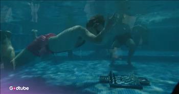 <p>You&rsquo;ve never seen chess played quite like this before. The popular game has undergone a significant twist, introducing an entirely new level of difficulty for players. Watch the short but jaw-dropping clip to hear and learn about the totally new and unexpected way some people are playing chess.</p>

<p>Most people love playing games of some kind. Games such as checkers, Uno and solitaire help us relax and take our minds off our concerns and worries for a short period of time. They are beneficial for the blood pressure and the mental health, and most of them require minimal effort.</p>

<p>However, some games do require much more thinking and strategy. Players must be focused on the task at hand and even thinking three or four steps ahead, in some cases. Now, the one game like this that immediately comes to most people&rsquo;s minds is chess. There are numerous methods and approaches to playing the game, and that doesn&rsquo;t even take into account trying to keep track of all the different ways the pieces can move across the board.</p>

<p>Well, <a href="https://www.youtube.com/watch?v=5nVEJTgqXlY">a video posted on YouTube</a> shows that some people are adding a whole new level of difficulty to the game. They are playing the game underwater. Yes, you read that right. They have to dive down to the bottom of a pool in order to make their moves. What is referred to as &ldquo;diving chess&rdquo; was first invented in London, England, and has since spread to other European countries.</p>

<p>An American, Hans Neimann, is one of the people who are playing this strange form of chess and recently did so during an exhibition in South Africa. The clip notes that the American player performed well during the exhibition matchup, ultimately emerging victorious.</p>

<p>I don&rsquo;t think I&rsquo;ll be participating in &ldquo;diving chess&rdquo; and think I&rsquo;ll wait for the &ldquo;diving checkers,&rdquo; instead. What about you? Is playing chess underwater something that appeals to you?</p>

<p><em><strong><a href="https://www.godtube.com/bible/1-timothy/4-8">1 Timothy 4:8</a></strong> &ldquo;For the training of the body is of profit for a little, but religion is of profit in every way, giving hope for the life which now is, and for that which is to come.&rdquo;</em></p>
