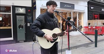 <p>Watch this incredible musical moment in the center of an outdoor mall. Check out as this street performer delivers a stunning cover of Bob Dylan&rsquo;s &lsquo;Blowin&rsquo; in the Wind.&rsquo;</p>

<p>Immediately, you will be intrigued by the skilled guitar notes from this young man, then he opens his mouth, and you hear his unique voice. You will want to hear more!&nbsp;</p>

<p>He has such a wonderful tone and clearly is a storyteller style of a performer. This young man is named Busker Zalan Kovacs. He is singing out boldly in an outdoor shopping center. As people walk past, he is pouring his heart out with his music.</p>

<p>This young man has a future in music. He possesses such skill, confidence, and calmness while performing. He doesn&rsquo;t appear nervous; he is just present with his song and shares his gifts with the world. He sings with conviction and authenticity. His skills reach far beyond his young years.</p>

<p>The chorus says:</p>

<p>The answer, my friend, is blowin' in the wind<br />
The answer is blowin' in the wind</p>

<p>This song was often used as a protest song during the Civil Rights Movement. The meaning of the song is that life is uncertain and unpredictable. Believers in Christ can cling to the hope that we have in Him in this sin-filled and broken world.&nbsp;</p>

<p>As you admire the talent of this young man and enjoy listening to this classic hit song, be reminded that even though we will have trouble in this world, we can take heart because Jesus has overcome the world. Whatever is troubling you, lay it down at the feet of Jesus today.&nbsp;</p>

<p><em>&ldquo;I have told you these things, so that in me you may have peace. In this world, you will have trouble. But take heart! I have overcome the world.&rdquo; <strong><a href="https://www.godtube.com/bible/John/16-33">John 16:33</a></strong></em></p>
