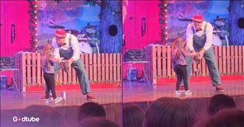 <p>A little girl became the star of a comedy show in the cutest way. She obviously enjoyed her time in the spotlight, helping to put on quite the show for the audience. Watch the short but precious and hilarious clip to see what the young woman did that will leave you laughing.</p>

<p>Most people have attended shows that ask for audience participation, selecting someone to come up on stage and take part in various activities. Whenever that request is made, with the person on stage stating that they need a volunteer, many will enthusiastically raise their hand, hoping to be picked. Additionally, some people will do everything they can to avoid eye contact, making it wholly clear that they do not want to be selected.</p>

<p>Some people genuinely enjoy the spotlight and having the attention of others. They want others to watch them while they do this or that. Of course, there are also those who want nothing to do with that kind of attention. They would rather hang back and watch the show instead of being a part of it. Being front and center is not for them.</p>

<p><a href="https://www.tiktok.com/@alyciahebenstreit/video/7471364624189902110">A clip posted on social media</a> captured one young woman who truly enjoyed being in the spotlight. Not only did she have, but her funny and adorable antics completely stole the show, with everyone in the audience loudly clapping for her precious and hilarious efforts.</p>

<p>The video begins with the performer leading the young lady on stage. Once on stage, she helps the performer by gathering cups for him. She does this continually, but as she picks them up, he drops one from the bottom. He does this several times, and she goes with it.</p>

<p>However, eventually the youngster catches on to what he&rsquo;s doing and quickly devises a hilarious and quick-witted solution. What she did next was unexpected. It was so funny and charming!</p>

<p><em><strong><a href="https://www.godtube.com/bible/ephesians/6-4">Ephesians 6:4</a></strong> &ldquo;And, you fathers, do not make your children angry: but give them training in the teaching and fear of the Lord.&rdquo;</em></p>
