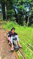 The two village children were playing traditional Lolorian games after coming home from school. They were very happy.
