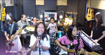 <p>Listen to this soul-stirring performance from a family band of the song &lsquo;Shout to the Lord.&rsquo; The talented musicians in the video are part of a family band called Missioned Souls. Let their rendition of this song uplift and encourage you today.</p>

<p>&lsquo;Shout to the Lord all the Earth, let us sing<br />
Power and majesty, praise to the King<br />
Mountains bow down and the seas will roar<br />
At the sound of Your name&rsquo;</p>

<p>What a beautiful and talented family! The members of the family band include husband and wife, Secan and Sheena, and their four children: Naces, who is 15 years old and plays the keyboard; Neisha, who is 13 years old and play lead guitar; Stacey, who is 11 years old and sings/play rhythm guitar; and Isaiah, who is 10 years old and plays drums.</p>

<p>This family band has a beautiful mission, as stated on their YouTube page. &ldquo;We are a family commissioned to propagate the importance of family unity by showing love and respect to each family member and for one another. We put into action our God-given gifts to bring joy and fun into other people&rsquo;s lives through music,&rdquo; their bio <a href="https://www.youtube.com/@MissionedSouls">reads</a>. &ldquo;Missioned Souls was born out of our earnest desire to give thanks for the simple musical talent we receive from above, thus, giving glory to the Holy Trinity.&rdquo;</p>

<p>As for the song &lsquo;Shout to the Lord,&rsquo; it was written by Darlene Zschech, who leads worship for the Hillsong television program, which broadcasts to over 160 countries. But at the time this song was written, Darlene was in a very stressful season of life.</p>

<p>&ldquo;It still takes my breath away to remember,&rdquo; <a href="https://worshipleader.com/worship-culture/music/song-story/song-story-shout-to-the-lord/">says</a> Darlene. &ldquo;I was not going to the piano to write an important song. I went to worship my God when I was at the end of myself. It was after another reminder notice came in for an overdue bill, and I kind of ran out of steam. But I went into a room where all the children&rsquo;s toys were, and my very old, out of tune, upright piano. I opened my Bible to the Psalms and started to pray. Within about twenty minutes, &lsquo;Shout&rsquo; had been composed. To be honest, I cannot really claim to have written the song&mdash;I &nbsp;just started singing it, bit by bit, again and again.&rdquo;&nbsp;</p>

<p>May this song be a reminder to us all to call out to the Lord in our times of need. He is our great comforter and healer. We hope that you enjoyed listening to this rendition of &lsquo;Shout to the Lord&rsquo; today.</p>
