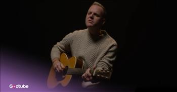 <p>It is amazing to see how Christian artists craft songs that express personal testimonies and communicate Biblical messages. It is so special when we have the opportunity to see the words that were written and reflect on them. Watch as Matthew West&rsquo;s uplifting and powerful &lsquo;Good&rsquo; gets a lyric video.&nbsp;</p>

<p>At the start of the clip, we see Matthew in the dark, sitting on a chair and playing guitar as he begins the song. The lyrics pop up at the bottom of the screen for you to join in or reflect on the words. At first, you think the song is about falling short and is more focused on humanity&rsquo;s sin.&nbsp;</p>

<p>As you get to the chorus, you are amazed by the lyrics because they turn out to be the testimony of every Christian: we are loved because God is good, even though we are not. It is cleverly crafted to turn the words towards what Jesus has done, and it is powerful.</p>

<p>The chorus sings out:</p>

<p>And I was wrecked by mercy<br />
The day I understood<br />
I'm not loved because I'm worthy<br />
I'm loved because You're good</p>

<p>You see Matthew sitting among water with lights around. He then gets in the water. It is very symbolic of the grace of God, like a river, and of His baptism of believers.&nbsp;</p>

<p>If you feel discouraged today over your sins and story, let this empower you with the truth that Jesus&rsquo; love and goodness covers you. We have all sinned and fallen short of God&rsquo;s glory, but His perfect sacrifice for us seals all who believe in Him. This video will have you singing with Matthew and celebrating your own story today.<br />
&nbsp;<br />
<em>&ldquo;There is no fear in love. But perfect love drives out fear, because fear has to do with punishment. The one who fears is not made perfect in love." <strong><a href="https://www.godtube.com/bible/1-John/4-18">1 John 4:18</a></strong></em></p>
