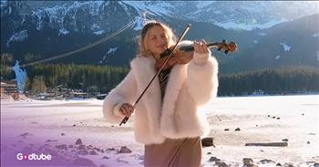 <p>Elvis Presley&rsquo;s Classic &ldquo;Can&rsquo;t Help Falling in Love&rdquo; has gotten a beautiful violin cover. This instrumental of the tune known and beloved by all is outstanding, and one that you will find yourself returning to again and again. Watch this short but awe-inspiring clip to listen to the young woman&rsquo;s jaw-dropping performance of Elvis Presley&rsquo;s &ldquo;Can&rsquo;t Help Falling in Love.&rdquo;</p>

<p>Elvis Presley is a Hollywood legend and icon. Decades after his passing, his songs remain as popular and beloved as ever. Some might even argue that they have only increased in popularity since he died in the late &lsquo;70s. His tunes are heavily played on Apple Music, Spotify and on thousands of radio stations around the world.</p>

<p>Not only do people still enjoy listening to the originals, but his timeless tunes are popular targets for covers. A simple search on YouTube would turn up hundreds, likely even thousands of pages of nothing more than musicians performing songs originally written and recorded by the King of Rock and Roll. Honestly, who doesn&rsquo;t love a good cover of one of Elvis Presley&rsquo;s many hits?</p>

<p><a href="https://www.youtube.com/watch?v=wAN-D-ftAG0">In a clip posted on YouTube</a>, a talented young woman covers one of Elvis&rsquo; most popular songs: &ldquo;Can&rsquo;t Help Falling in Love.&rdquo; If nothing else, it&rsquo;s easily his most beloved and recognizable love song. Regardless, her cover is very different from many of the others you&rsquo;re likely to come across. Instead of belting out those beautiful, familiar lyrics, she opts not to sing at all. It&rsquo;s an instrumental version where she plays the violin, and it&rsquo;s absolutely stunning. I&rsquo;m not sure instrumental covers get any better than this.</p>

<p>In addition to her superb performance, the woman is in a picture-perfect location, with a majestic, snow-covered mountain right behind her. It&rsquo;s a three-minute video that is a feast for the ears, and given her breathtaking location, one for the eyes as well.</p>

<p><em><strong><a href="https://www.godtube.com/bible/ephesians/5-19">Ephesians 5:19</a></strong> &ldquo;Speaking to yourselves in psalms and hymns and spiritual songs, singing and making melody in your heart to the Lord;&rdquo;</em></p>
