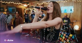 <p>Prepare for this energetic moment and get ready to dance-along! Watch this fantastic cover of Dolly Parton&rsquo;s classic &lsquo;9 to 5.&rsquo;<br />
&nbsp;<br />
At the start of this fun-filled video, an old-time television is playing, and a saxophone plays in the background. You suddenly see the talented saxophonist. He is extremely gifted.&nbsp;</p>

<p>The singer jumps into the shot with him and smiles, and it is entertaining to see all of the unique instruments from drums to a triangle! This group is skilled with their harmonies. It is encouraging to see such a large band coming together to perform a song. This is no small task.&nbsp;</p>

<p>You will see the pretty twinkle lights shining around the room. The group has a sign saying &ldquo;Dwayne&rsquo;s World.&rdquo; The vocal runs are exciting, and the lead and background vocals have flair and groove while they perform.&nbsp;</p>

<p>The garage band vibe is really entertaining. You will feel as if you are there in the room. What you will especially enjoy is the teamwork that this group has with one another. They have a clear chemistry and complement one another. All of the different musicians appear to be having a blast.&nbsp;</p>

<p>There is a super exciting moment when the singer and the saxophonist dance together and end up back-to-back. You will not be able to help but smile and bob your head with this fun tribute to Dolly Parton.&nbsp;</p>

<p>Whether you are getting off of a long work day yourself or preparing for the next one, this song can get you singing and laughing in the midst of hard days or even challenging bosses. God reminds us that we can do everything for His glory.</p>

<p><em>&ldquo;Whatever you do, work heartily, as for the Lord and not for men, knowing that from the Lord you will receive the inheritance as your reward. You are serving the Lord Christ." <strong><a href="https://www.godtube.com/bible/Colossians/3-23">Colossians 3:23-24</a></strong></em></p>
