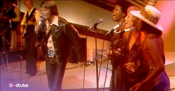 <p>Glen Campbell delivered a fantastic cover of "My Girl." The late singer-songwriter turned in a jaw-dropping, awe-inspiring rendition of the classic song made famous by The Temptations. This is one cover that you're likely to return to again and again. Watch the short, but immensely enjoyable, clip to see and hear his delightful performance of "My Girl."</p>

<p>Musical covers have been around for quite some time and will be here for the long haul. Covers are likely a practice as old as music itself. While American Idol, America's Got Talent and social media sites like YouTube and TikTok may have reignited interest surrounding covers, they are much older than those shows and platforms.</p>

<p>Covers aren't just for the hopefuls on <em>American Idol</em> and social media users. Every band and musician has done a cover at some point, guaranteed. It doesn't matter if you're The Rolling Stones, The Eagles or some other legendary band. They have all done it. <a href="https://www.youtube.com/watch?v=teUlC3aLSJQ">A clip posted on YouTube</a> proves that some of the most beloved and talented musicians of all time have done it.</p>

<p>In the video, Glen Campbell performs "My Girl." It's a dazzling, delightful performance in which the musician's talent shines bright. However, this is most certainly a lovely performance, but it's a cover. The song, of course, was first made famous by The Temptations. It will forever remain their song, but Glen's version is also very enjoyable.</p>

<p>"I've got sunshine on a cloudy day<br />
When it's cold outside, I've got the month of May<br />
I guess you'd say<br />
What can make me feel this way?"</p>

<p>&nbsp;It's not surprising that the "Rhinestone Cowboy" singer would do covers, but I'm guessing not many people remember he ever covered this tune. It certainly does not seem like a song he would ever have covered, but musicians are always looking for ways to stretch themselves and get the most out of their God-given talent.</p>

<p><em><strong><a href="https://www.godtube.com/bible/colossians/3-16">Colossians 3:16</a></strong> "Let the word of Christ dwell in you richly in all wisdom; teaching and admonishing one another in psalms and hymns and spiritual songs, singing with grace in your hearts to the Lord."</em></p>
