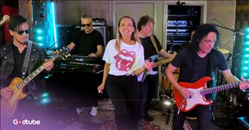 <p>If your day needs a little sparkle, a lot of swagger, and the kind of joy that makes you turn the volume up just one more notch, this dazzling cover of Pat Benatar&rsquo;s &lsquo;Hit Me With Your Best Shot&rsquo; delivers all of it&mdash;and then some.</p>

<p>Recorded in a basement studio in South Australia, this live-band performance proves that big energy doesn&rsquo;t need a big stage. Someone&rsquo;s old garage will do the job just fine! Produced by Darren Mullan for the <a href="https://www.youtube.com/@singitliveworld">Sing It Live</a> series, the video captures everything we love about classic rock covers done right: raw talent, tight chemistry, and the kind of fun that feels contagious through the screen.</p>

<p>From the very first beat, singer Nikki Heuskes owns the room. Her voice is bold, confident, and playful, channeling the fearless spirit of Pat Benatar while keeping the song fresh and alive. Nikki sings like she&rsquo;s having the time of her life, and you can&rsquo;t help but smile along with her.</p>

<p>The band behind her is equally electric. Crisp guitars, punchy drums, and that unmistakable groove lock together in a way that feels effortless. You can tell these musicians love what they&rsquo;re doing. There&rsquo;s a relaxed confidence here, the kind that only comes when everyone in the room trusts each other and the music.</p>

<p>What makes this performance especially fun is its behind-the-scenes feel. Shot on an iPhone and recorded live, the video invites you into the moment&mdash;no flashy effects, no overproduction because it&rsquo;s just these talented people doing what they do best. It feels like stumbling upon an incredible jam session you&rsquo;re lucky enough to witness, which is especially nice in the middle of your work day!</p>

<p>Originally released in <a href="https://en.wikipedia.org/wiki/Hit_Me_with_Your_Best_Shot">1980</a>, &lsquo;Hit Me With Your Best Shot&rsquo; became one of rock&rsquo;s most recognizable anthems, climbing into the Top 10 and cementing its place in music history. Decades later, this cover reminds us why the song still hits so hard. It&rsquo;s confident. It&rsquo;s catchy. And it&rsquo;s impossible not to move along, and it's the anthem we sing when it comes to dealing with toddler tantrums, work deadlines, and that pile of laundry still sitting on your bed.&nbsp;</p>

<p>With more than 80,000 views and counting, it&rsquo;s the kind of video you immediately want to send to a friend with the message, &ldquo;You have to watch this.&rdquo; So go ahead. Turn it up. Sing along. And let this basement-born performance remind you that great music still knows how to have a little fun.</p>
