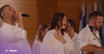 <p>Get ready to be blessed by the nations glorifying Jesus. Watching this beautiful multilingual performance of &lsquo;Goodness of God&rsquo; will move you.&nbsp;</p>

<p>At the beginning of this song, there is such a genuine and precious prayer from the first worship leader. The instruments play beautifully in the background. There are people dressed in white all on the stage. The song, &ldquo;Goodness of God,&rdquo; begins with the male vocalist singing in Hebrew. It is stunning.&nbsp;</p>

<p>The second verse is sung in English by the female singer. Suddenly, a man sings in Arabic. The female vocalist has gorgeous background vocals.&nbsp;</p>

<p>The crowd is pouring out their hearts in praise. Three languages come together to celebrate God's faithfulness. This is a taste of heaven with many cultures and various instruments.&nbsp;</p>

<p>God tells us in His Word that every tribe and tongue will be around His throne worshiping Him in heaven. It is not too often that we see and hear these various languages coming together in one song. It causes us to think about what sin separates, Jesus unites.&nbsp;</p>

<p>The chorus sings out:</p>

<p>All my life You have been faithful<br />
All my life You have been so, so good<br />
With every breath that I am able<br />
I will sing of the goodness of God</p>

<p>Whether we live on one end of the globe or another, God has been faithful to who He is always. It is beautiful to see One For Israel come and lead in such a powerful time of gratitude for the Lord. They sing together in each other&rsquo;s languages. No matter what your native language is, you will appreciate this video, stunning vocals, and instrumentation.&nbsp;</p>

<p>One For Israel was established in the 1990s. It started as a Bible College, but has expanded in hopes of blessing people across Israel and meeting them in their own language. We get to witness this powerful ministry in the video.&nbsp;</p>

<p><em>&ldquo;After this I beheld, and, lo, a great multitude, which no man could number, of all nations, and kindreds, and people, and tongues, stood before the throne, and before the Lamb, clothed with white robes, and palms in their hands.&rdquo; <strong><a href="https://www.godtube.com/bible/Revelation/7-9">Revelation 7:9</a></strong></em></p>
