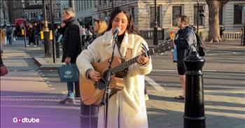<p>English street busker Leire is back with another song. Her stunning cover of Dolly Parton&rsquo;s &ldquo;Here You Come Again&rdquo; performed on the street will lift your spirits. Play the video to hear the unique and bright song cover.&nbsp;</p>

<p>Leire starts off her song on what looks to be a busy and cold morning on a London street corner. As she stands with her guitar in hand with her mic hooked up, her rich voice completely fills the street.&nbsp;</p>

<p>Her cover is much different than Dolly&rsquo;s original song, but it&rsquo;s still bright and shiny. Though it doesn&rsquo;t sound much like Dolly&rsquo;s peppy piano version, I think she&rsquo;d be proud to hear Leire sing her song. The young woman has a magical charm to her voice that draws people in.&nbsp;</p>

<p>People line up on the cobblestones just to hear her voice and see her perform. She&rsquo;s a wonder to behold. Some of the song&rsquo;s <a href="https://genius.com/Dolly-parton-here-you-come-again-lyrics">lyrics</a> she sings are:&nbsp;</p>

<p>Just when I'm about to make it work without you<br />
You look into my eyes<br />
And lie those pretty lies<br />
And pretty soon I'm wondering' how I came to doubt you</p>

<p>The 1977 hit is one of Parton&rsquo;s only songs that she didn&rsquo;t write herself, but it&rsquo;s the first single of hers to sell over 1 million copies. It was written by Cynthia Weil and Gary Klein.&nbsp;</p>

<p>&ldquo;Gary Klein, I think, was producing Dolly Parton, and he heard it, and he loved it. Dolly, who was so gracious and adorable thanks us every time she sees us, for the song,&rdquo; Cynthia <a href="https://americansongwriter.com/meaning-behind-dolly-partons-first-million-selling-hit-here-you-come-again/">said</a>.&nbsp;</p>

<p>&ldquo;At the time, she felt it might be a little too slick and might cost her some of her country fans,&rdquo; she <a href="https://americansongwriter.com/meaning-behind-dolly-partons-first-million-selling-hit-here-you-come-again/">continued</a>. &ldquo;But she was talked into doing it and now she&rsquo;s thrilled that she did.&rdquo;</p>

<p>And the world is, too! It&rsquo;s a beautiful song</p>
