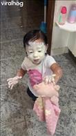 My Daughter Covered Her Face in Diaper Rash Cream - Child applies diaper rash cream to face. Credit: Kleydenize Oliveira
