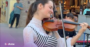 <p>Check out this talented young violinist's take on two iconic classics by Elvis and ABBA. The violin player is Avelina Kushnir. The first song she performs is &lsquo;Fernando&rsquo; by ABBA which came out in 1976, and she follows that one up with &lsquo;Can&rsquo;t Help Falling in Love&rsquo; by Elvis, which was released in 1961.</p>

<p>The song &lsquo;Fernando&rsquo; was first recorded in Swedish and was a simple love song about comforting a heartbroken friend. ABBA then re-recorded it in English, and that version became one of the best-selling singles of all time, with over 10 million physical copies sold.</p>

<h2>Can&rsquo;t Help Falling in Love By Elvis Presley is a Top Romantic Hit&nbsp;</h2>

<p>As for &lsquo;Can&rsquo;t Help Falling in Love,&rsquo; that song was recorded by Elvis Presley for the film Blue Hawaii. It became a signature romantic hit, closing most of Elvis's 1970s concerts.</p>

<p>Avelina put on a spectacular performance with both of these iconic songs, with her mother accompanying her on the keyboard. The music captivated onlookers as they passed Avelina by on the street, and many people stopped to really take in and appreciate the show. People online also shared how impressed they were with her musical talents.</p>

<p>&ldquo;Honestly, who could possibly help but fall in love with this absolutely beautiful rendition of this classic Elvis song by Avelina and her Mom,&rdquo; <a href="https://www.youtube.com/watch?v=EyXBxoObhEI">comments</a> one person after watching the video.</p>

<p>&ldquo;Such a beautiful and heartfelt performance &mdash; it truly touches the heart. Keep shining and sharing your amazing talent,&rdquo; <a href="https://www.youtube.com/watch?v=EyXBxoObhEI">writes</a> another person.</p>

<p>Avenlina is a talented teenager who plays the violin, saxophone, and guitar. She loves playing music and hopes to use her talent to make the world a better place.&nbsp;</p>

<p>We hope that you enjoyed watching this violin performance from Avelina Kushnir of &lsquo;Fernando&rsquo; and &lsquo;Can&rsquo;t Help Falling in Love.&rsquo; Let the beautiful music bring you some joy today!</p>

