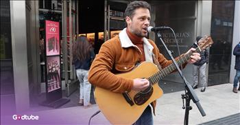 <p>This Irish busker stuns with a rendition of CCR's &ldquo;Proud Mary.&rdquo; He stands on a street path, armed only with a mic and a guitar, yet delivers a pleasantly powerful performance. It&rsquo;s a unique acoustic cover that you&rsquo;ll have in your head for the rest of the day.&nbsp;</p>

<p>The busker, David Brennan, is harmoniously coordinated with his look and musical style. His pizazz and charm have people stopping in their tracks to hear him.</p>

<p>Some of the <a href="https://genius.com/Creedence-clearwater-revival-proud-mary-lyrics">lyrics</a> to the busker&rsquo;s "Proud Mary" CCR cover are:&nbsp;</p>

<p>If you come down to the river<br />
Bet you gonna find some people who live<br />
You don't have to worry 'cause you have no money<br />
People on the river are happy to give</p>

<p>David has an interesting vibrato that he adds to &ldquo;river&rdquo; parts that I haven&rsquo;t heard before. It gives the song a different feel and makes it his own.&nbsp;</p>

<p>&ldquo;Proud Mary&rdquo; is one of those songs that makes everyone feel good. It&rsquo;s a nod to a more peaceful life. Even if you don&rsquo;t have much, sometimes it&rsquo;s better than working away the joy of life.&nbsp;</p>

<h2>&ldquo;Proud Mary&rdquo; Was Written After John Fogerty Was Discharged From the Army&nbsp;</h2>

<p>Clearance Clearwater Revival&rsquo;s John Fogerty wrote the song after he was honorably discharged from the Army.&nbsp;</p>

<p>&ldquo;I was so happy, I ran out into my little patch of lawn and turned cartwheels. Then I went into my house, picked up my guitar and started strumming. &lsquo;Left a good job in the city&rsquo; and then several good lines came out of me immediately.&rdquo; he <a href="https://americansongwriter.com/from-a-maid-to-a-riverboat-the-origins-of-the-creedence-clearwater-revival-song-turned-tina-turner-chart-topper-proud-mary/">said</a>.&nbsp;</p>

<p>&ldquo;By the time I hit &lsquo;Rolling, rolling, rolling on the river,&rsquo; I knew I had written my best song. It vibrated inside me. When we rehearsed it, I felt like Cole Porter,&rdquo; he <a href="https://americansongwriter.com/from-a-maid-to-a-riverboat-the-origins-of-the-creedence-clearwater-revival-song-turned-tina-turner-chart-topper-proud-mary/">said</a>.&nbsp;</p>

<p>This busker&rsquo;s "Proud Mary" CCR cover honors the original song well. David has a bright singing career ahead of him.</p>
