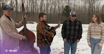 <p>Check out this wonderful &ldquo;In The Garden&rsquo; hymn bluegrass cover performed by a group called Backwoods Bluegrass. The talented musicians did a great job conveying the meaning of this beautiful hymn. The lyrics reflect a personal, intimate relationship with God, often described as a peaceful, contemplative walk with Jesus in a garden setting.</p>

<p>&ldquo;I come to the garden alone while the dew is still on the roses<br />
And the voice I hear, falling on my ear, the Son of God discloses<br />
And He walks with me, and He talks with me, and He tells me I am His own<br />
And the joy we share as we tarry there, none other has ever known&rdquo;</p>

<h2>&lsquo;In the Garden&rsquo; is Quite the Cherished Hymn</h2>

<p>What a lovely rendition of this cherished hymn! In the video, Rusty Collier is on bass, Austin Harper is on Mandolin, Hunter Phillips is on Guitar, and Sarah Stewart is on Banjo. Their harmonies were beautiful, and many people online praised this "In the Garden" hymn bluegrass cover.</p>

<p>&ldquo;So pure and heartfelt; just honest bluegrass gospel!&rdquo; <a href="https://www.youtube.com/watch?v=lYInaalkxFQ">comments</a> one person on YouTube.</p>

<p>&ldquo;Great job! One of my favorite versions ever of this beautiful hymn!&rdquo; <a href="https://www.youtube.com/watch?v=lYInaalkxFQ">writes</a> another person after watching the music video.</p>

<p>When it comes to the hymn &ldquo;In The Garden,&rdquo; this is one song that is enormously popular. It is almost impossible to find it omitted from any standard hymnal, and more than a million recordings and printed copies of it have been sold.</p>

<p>The man who wrote this beloved hymn was C. Austin Miles. He had attended the Philadelphia College of Pharmacy and the University of Pennsylvania to become a pharmacist, but he abandoned that career in 1892 when he wrote his first Gospel song.</p>

<p>He <a href="https://www.staugustine.com/story/lifestyle/faith/2015/03/05/story-behind-song-garden/16247416007/">said</a> of himself, "It is as a writer of gospel songs I am proud to be known, for in that way I may be of the most use to my master, whom I serve willingly although not as efficiently as is my desire."</p>

<p>We hope you enjoyed listening to this bluegrass rendition of &ldquo;In The Garden&rdquo; today!</p>
