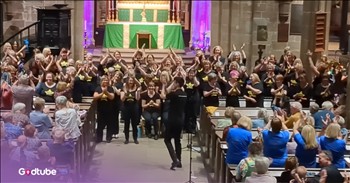 <p>There are some videos you casually scroll past on the internet&mdash;and then there are the ones that make you stop everything, grin like a fool, and immediately send the link to your best friend, saying, &ldquo;YOU HAVE TO WATCH THIS.&rdquo; This choir brings pure joy to the &lsquo;I Wanna Dance with Somebody&rsquo; cover, which is absolutely one of those moments.&nbsp;</p>

<p>Honestly? It was fun to watch the energy and nostalgia from the song ripple from the choir to the audience from the very first note. People joined in to sing, some clapping, others dancing, and all in all, everyone was enjoying the moment.&nbsp;</p>

<h2>&ldquo;I Wanna Dance With Somebody&rdquo; Was Originally Recorded and Released Back in 1987</h2>

<p>&ldquo;I Wanna Dance with Somebody (Who Loves Me)&rdquo; was originally <a href="https://en.wikipedia.org/wiki/I_Wanna_Dance_with_Somebody_(Who_Loves_Me)">recorded</a> by American singer Whitney Houston as the lead single from her second album, Whitney, released in 1987. Decades later, the song still has this magical ability to make people smile instantly. The lyrics are pure joy wrapped in music:</p>

<p>&ldquo;Oh, I wanna dance with somebody<br />
I wanna feel the heat with somebody<br />
Yeah, I wanna dance with somebody<br />
With somebody who loves me&rdquo;</p>

<p>And hearing those lyrics echo through a packed church in Chesterfield somehow makes them feel even more special.</p>

<p>The performance, which has already racked up an incredible 1,031,066 <a href="https://www.youtube.com/watch?v=kNoxGjjPoAQ">views</a> on YouTube, features a group of local choirs originally led by choirmaster Tom Rigby. He built each choir from the ground up under the umbrella of Rock Choir, one of the UK&rsquo;s best-known choir organizations.&nbsp;</p>

<p>The event took place inside the beautiful Church of St Mary and All Saints, and honestly, there&rsquo;s something so heartwarming about seeing a church filled not only with worship but with laughter, music, dancing, and community.&nbsp;</p>

<p>But what makes this video unforgettable isn&rsquo;t just the music. It&rsquo;s the people. It&rsquo;s watching strangers beam at each other. It&rsquo;s seeing older couples clap along while younger audience members dance in the aisles. It&rsquo;s hearing hundreds of voices come together for a few beautiful minutes where nobody cared about stress, bad news, or the weight of the world outside those church walls.</p>

<p>For a moment, everyone simply chose joy. And honestly? We could all use a little more of that.</p>

<p><strong>YOU MAY ALSO LIKE: <a href="https://www.godtube.com/watch/?v=YYZPL7NX">5 Irish Boys Perform 'I Just Want To Dance With You</a></strong></p>

<p><em>&ldquo;Praise Him with the tambourine and dancing; praise Him with strings and pipe!&rdquo; <strong><a href="https://www.godtube.com/bible/psalms/150-4">Psalm 150:4</a></strong></em></p>
