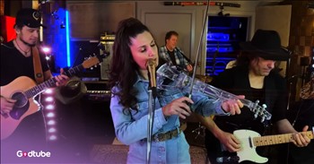 <p>This cover band&rsquo;s beautiful cover of &ldquo;Jolene&rdquo; captivates and stuns. The lead singer, Chloe Castledine, does a really wonderful job of singing the Dolly Parton classic. Watch the video to sing along.</p>

<p>The "Jolene" Dolly Parton cover is hearty and full of country rhythm. The band plays with plenty of twangy instruments, and an electronic violin is a nice touch. All in all, it&rsquo;s a wonderful tribute to the queen of country, Dolly Parton.&nbsp;</p>

<p>Some of the lyrics the Sing it Live band sings in their cover are:&nbsp;</p>

<p>And I can easily understand<br />
How you could easily take my man<br />
But you don't know what he means to me, Jolene<br />
[Chorus]: Jolene, Jolene, Jolene, Jolene</p>

<h2>Dolly Parton Wrote &ldquo;Jolene&rdquo; After a Bank Teller Flirted With Her Husband&nbsp;</h2>

<p>Dolly was inspired to write the song after a bank teller kept flirting with her obviously married husband.&nbsp;</p>

<p>"He was a little embarrassed when I wrote the song 'Jolene' because, actually, it wasn't as serious [as it seems]. I was just jealous 'cause she was a beautiful woman and he was just flirting," Dolly <a href="https://www.nbc.com/nbc-insider/dolly-parton-jolene-song-history-meaning-covers">said</a> of her husband.</p>

<p>She also <a href="https://people.com/dolly-parton-jolene-real-story-carl-dean-11690138">said</a>, &ldquo;Something good can come from anything. Had it not been for that woman, I would never have written 'Jolene' and I wouldn't have made all that money, so thank you, Jolene.&rdquo;<br />
The woman&rsquo;s name wasn&rsquo;t actually Jolene. Dolly had a young fan with that name, and she had told her she would find a way to include her name in one of her songs.&nbsp;</p>

<p><strong>YOU MAY ALSO LIKE: <a href="https://www.godtube.com/watch/?v=GGDKWWNX">PS22 Chorus Stunning Cover of Dolly Parton's 'Light of a Clear Blue Morning</a></strong></p>

<p>It&rsquo;s been 53 years since the song came out, and it has been <a href="https://people.com/dolly-parton-jolene-real-story-carl-dean-11690138">sung</a> in many languages by many well-known singers like Miley Cyrus, Beyonc&eacute;, and more.&nbsp;</p>

<p>It&rsquo;s a song with a great sound. Once you hear it, you can&rsquo;t forget it. And Sing it Live truly does a wonderful job in their "Jolene" Dolly Parton cover.</p>
