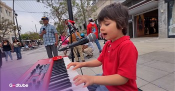 <p>Check out this talented little one perform "Can't Help Falling in Love&rdquo; by Elvis on his keyboard. The young boy is 5-year-old Nicholas Protsenko, and he is bringing joy and inspiration to the streets with his wonderful performance of this beloved song. This rendition is definitely a heartwarming one!</p>

<p>&lsquo;Wise men say, &lsquo;only fools rush in&rsquo;<br />
But I can't help falling in love with you<br />
Shall I stay? Would it be a sin<br />
If I can't help falling in love with you?&rsquo;</p>

<h2>What a great street performance of "Can't Help Falling in Love&rdquo; by Elvis!&nbsp;</h2>

<p>And the crowds passing by are definitely enjoying Nicholas and his lovely music.</p>

<p>Nicholas is part of the talented Protsenko family, which deeply loves music and one another. Karolina, the oldest of her siblings, is a talented young musician who plays violin, sings, and loves reading and baking. Leo, the middle brother, is known to pick up any instrument and sing along whenever he hears music. He&rsquo;s also very good at playing piano. Nicholas, the youngest of the bunch, also plays piano and uses his voice to add music to the family.</p>

<p>Nicholas&rsquo;s older sister, Karolina, shared how much it meant to her to see her littlest brother putting on such an amazing performance.</p>

<p>&ldquo;I still can&rsquo;t believe my little brother is only 5,&rdquo; she <a href="https://www.youtube.com/watch?v=db9IAgUWAb4">writes</a> online. &ldquo;Watching him sing &lsquo;Can&rsquo;t Help Falling In Love&rsquo; in front of so many people made me so emotional. He sang with his whole heart and I&rsquo;m honestly so proud of him.&rdquo;</p>

<p>As for &ldquo;Can&rsquo;t Help Falling in Love,&rdquo; that song was recorded by Elvis Presley for the film Blue Hawaii. It became a signature romantic hit, closing most of Elvis's 1970s concerts.</p>

<p>We hope you enjoyed listening to this sweet rendition of &ldquo;Can&rsquo;t Help Falling in Love&rdquo; today!</p>

<p><strong>YOU MAY ALSO LIKE: <a href="https://www.godtube.com/watch/?v=E1010MNU">Life in 3D's Chilling Rendition of Coldplay's 'Viva La Vida</a></strong></p>
