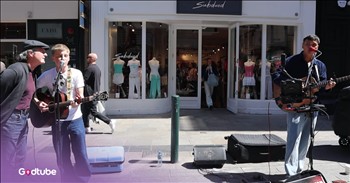 <p>Sometimes the best concerts aren't held beneath bright stage lights. They're found on a busy street corner where two musicians, a guitar, and a timeless song are enough to make the whole world stop and listen, like this Bob Dylan cover by these street musicians&ndash;it&rsquo;s fantastic!&nbsp;</p>

<p>Music artist, Rhys McPhillips joined Jacob Koopman on the streets of Dublin to sing &lsquo;Don't Think Twice, It's Alright.&rsquo;</p>

<p>As the familiar chords drifted through the air, people walking by slowed their pace. Before long, a crowd had gathered around these talented youngsters, drawn in by the rich harmonies and effortless chemistry between the two musicians.</p>

<p>What makes the performance especially captivating is how Rhys and Jacob begin the song. They trade lines in beautifully timed rounds before blending seamlessly into Dylan's gritty, heartfelt lyrics. Their voices complement one another so naturally that it's hard to believe the performance wasn't taking place on a professional stage.</p>

<p>Passersby couldn't resist pulling out their phones to record the unforgettable moment. Smiles spread across the crowd as strangers paused their busy day to soak in the music. And the song itself carries a fascinating history.</p>

<p>Bob Dylan <a href="https://www.songfacts.com/facts/bob-dylan/dont-think-twice-its-all-right">wrote</a> &lsquo;Don't Think Twice, It's Alright&rsquo; after his girlfriend, Suze Rotolo, left New York to study at the University of Perugia in Italy. Rather than writing the song from the perspective of the one left behind, Dylan imagined himself as the one walking away. The song appeared on his <a href="https://www.songfacts.com/facts/bob-dylan/dont-think-twice-its-all-right">1963</a> album, The Freewheelin' Bob Dylan, whose iconic cover features Dylan and Rotolo walking arm in arm through the streets of New York City.</p>

<p>More than six decades later, the song continues to resonate with listeners around the world, proving that honest songwriting never goes out of style.</p>

<p>It ain't no use to sit and wonder why, babe<br />
If'n you don't know by now<br />
And it ain't no use to sit and wonder why, babe<br />
It'll never do somehow</p>

<p>Watching Rhys and Jacob perform, it's hard not to think these two are destined for bigger stages. They have the kind of effortless talent that turns heads and quiets crowds. Don't be surprised if one day you see one&mdash;or both&mdash;of them on The Voice or another national stage. They certainly have the musicianship to get there.</p>

<p>There's something sacred about music shared in unexpected places. For just a few minutes, a noisy Dublin street became a place where strangers stood shoulder to shoulder, united by melody instead of hurry.&nbsp;</p>

<p>We spend so much of life rushing from one destination to the next that we forget to notice the beauty unfolding around us. But every now and then, someone starts playing a familiar song, and we're reminded to slow down, linger a little longer, and let our hearts be moved. Maybe that's one of God's sweetest gifts&mdash;that He still gives us moments that stop us in our tracks and remind us that beauty is never in short supply if we're willing to listen.</p>

<p><em>"Sing to Him a new song; play skillfully, and shout for joy." &nbsp;<strong><a href="https://www.godtube.com/bible/psalms/33-3">Psalm 33:3</a></strong></em></p>

<p><strong>YOU MAY ALSO LIKE: <a href="https://www.godtube.com/watch/?v=EEFJEMNU">Exclusive: Michael Sarver Performs 'Count It All Joy' in Powerful Studio Visualizer</a></strong></p>
