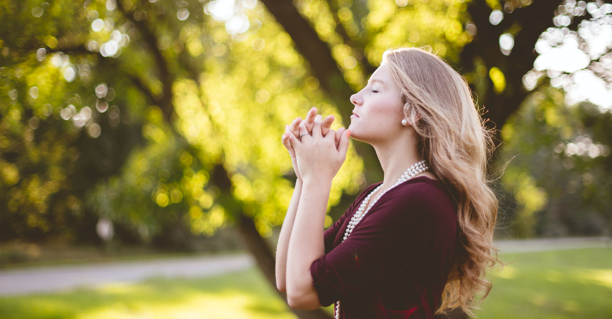 woman praying to calm herself, pray without ceasing