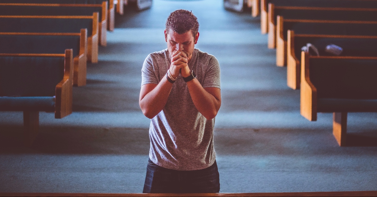 Christian People Praying In Church