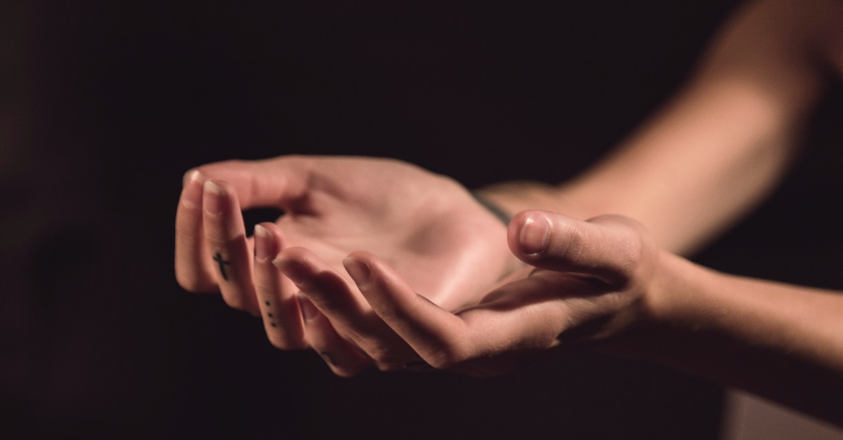 Open praying hands