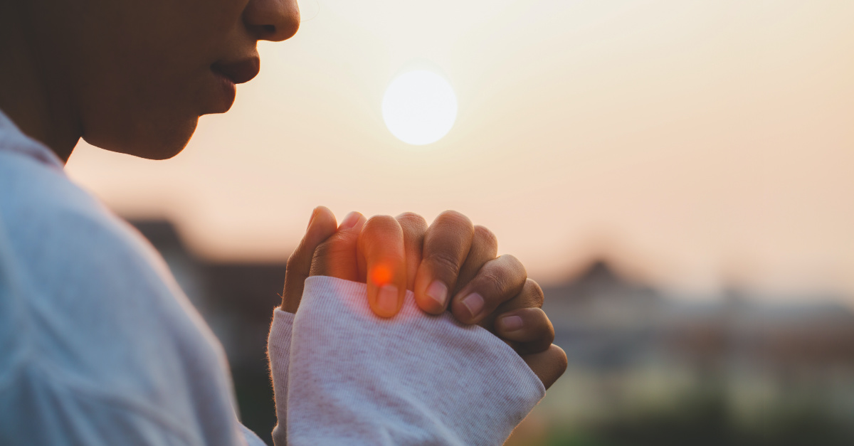 A woman praying, fruit of the spirit