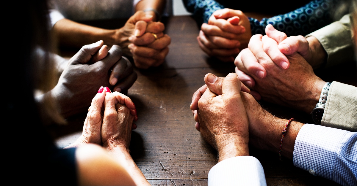 pics of joining hands for prayer