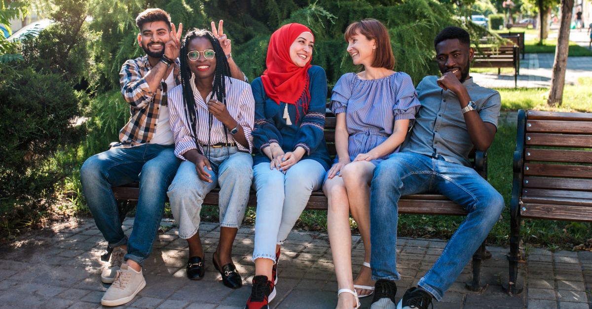 multicultural group of friends together smiling racial diversity