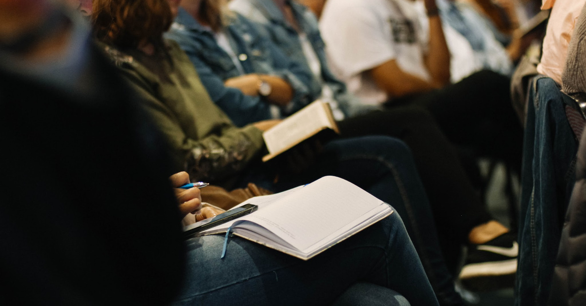 Church congregants sitting and listening together