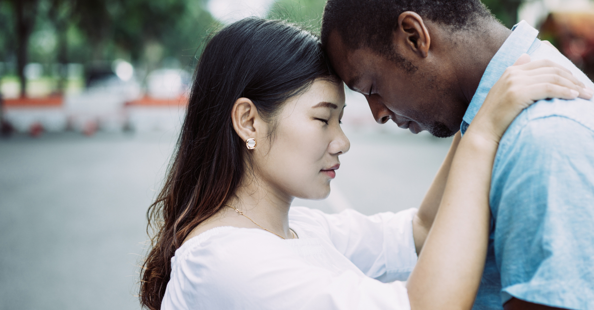 couple touching foreheads forgiveness