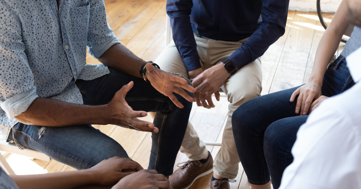 conversation in a small diverse group addressing racial healing