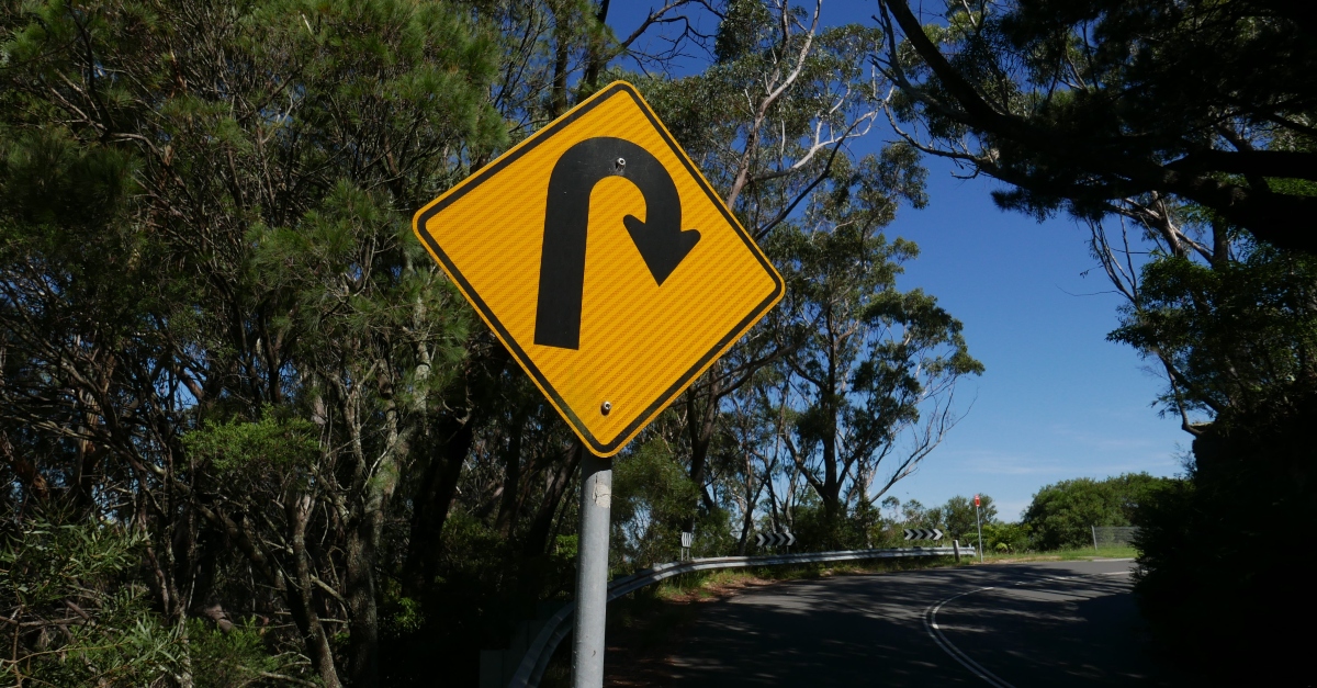 U-turn sign on a road