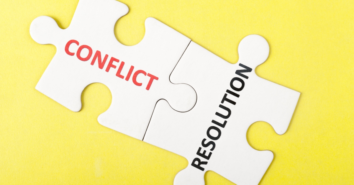 conflict and resolution puzzle pieces fit together