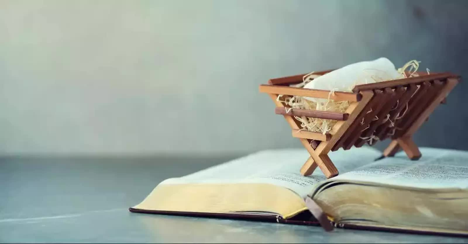 Manger on top of a Bible