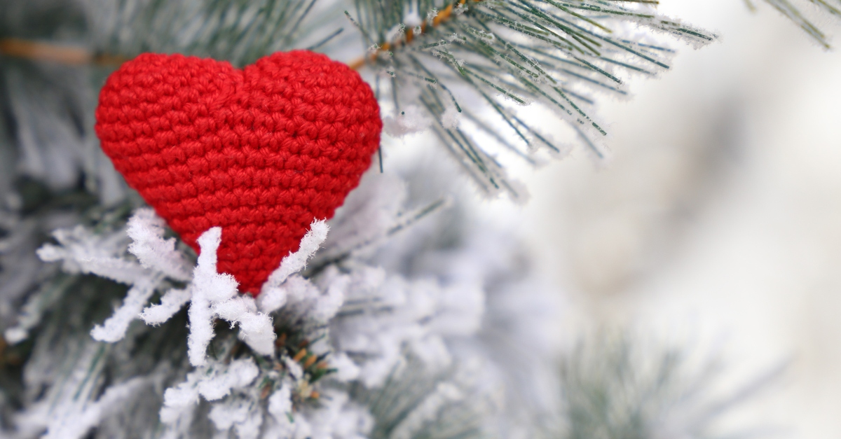 crocheted heart decoration in a christmas tree, four week advent bible study