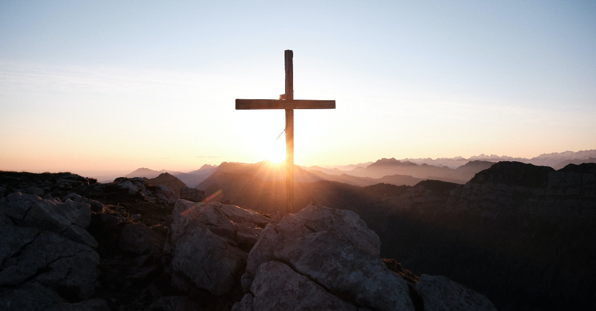 cross on top of mountain with sunrise, yannick-pulver-unsplash
