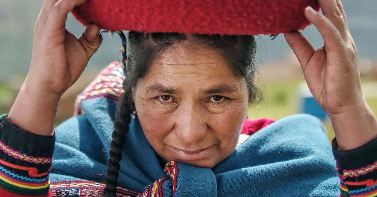 A woman with a pot on her head, Magical Andes still