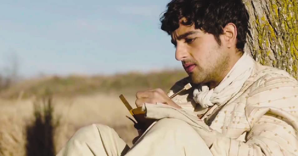 A man sitting in a dessert in The Chosen