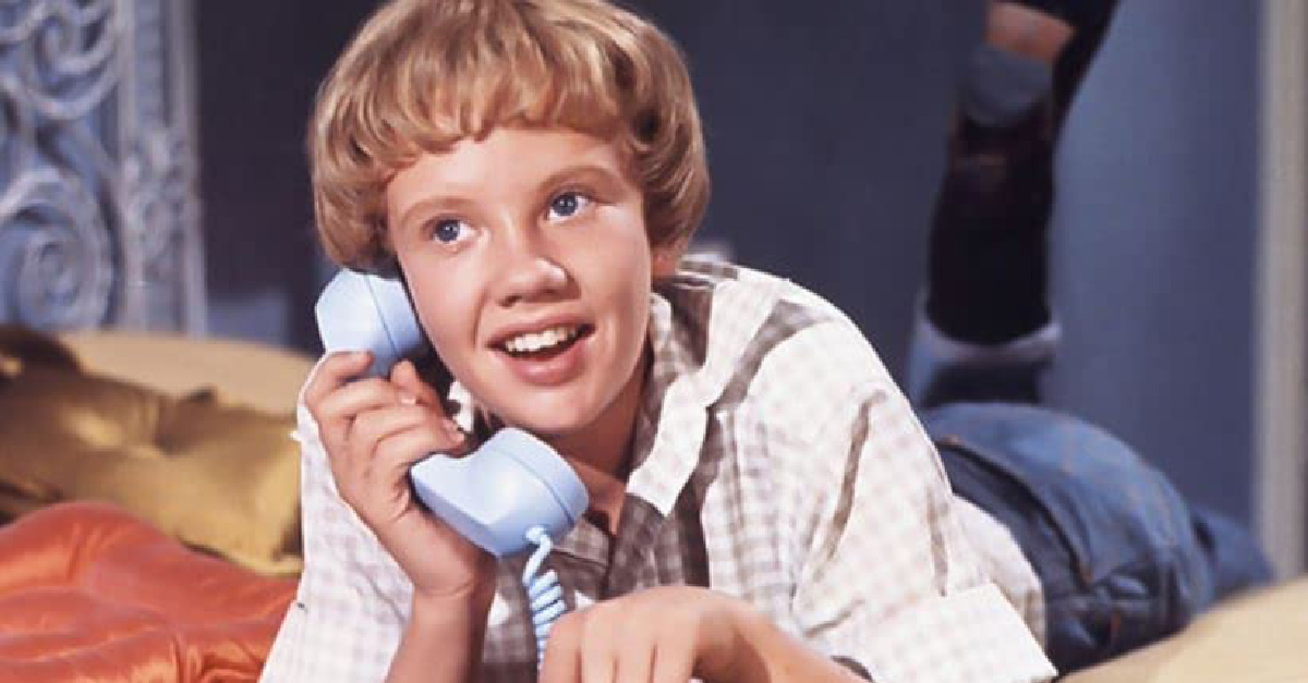 A young person on the phone from Parent Trap