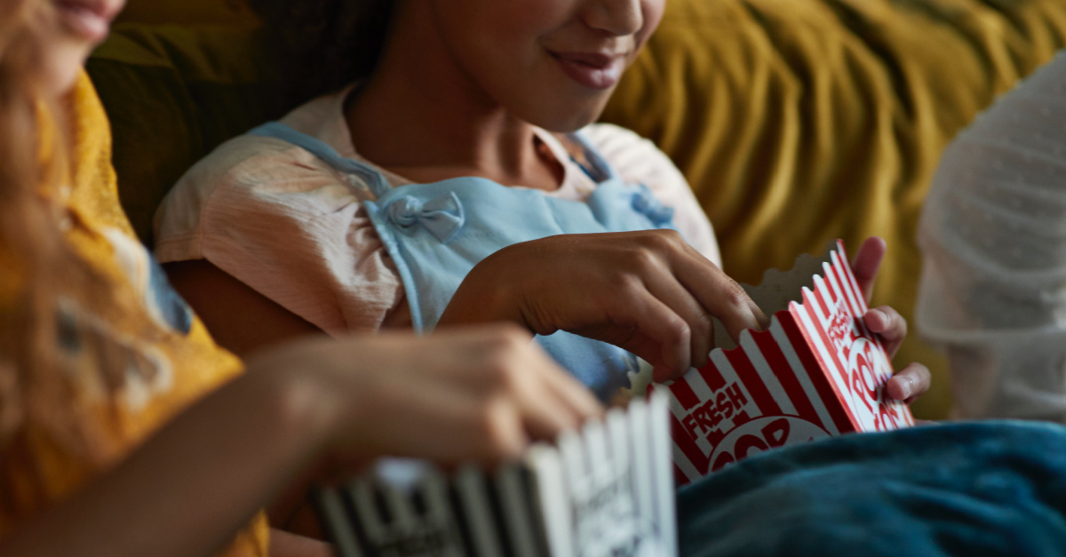 Kids eating movie popcorn, Movies and shows streaming this summer