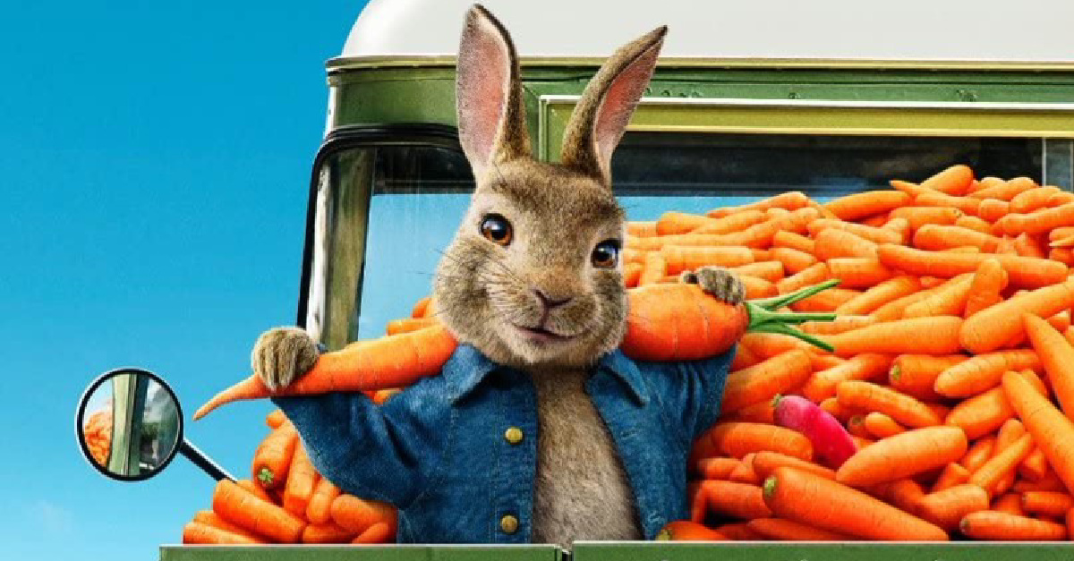 Petter Rabbit holding a carrot