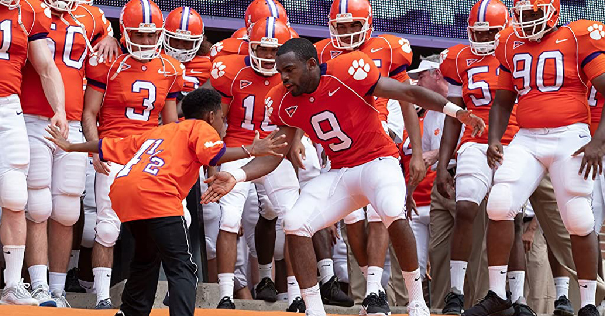 A young boy and a football team, Safety