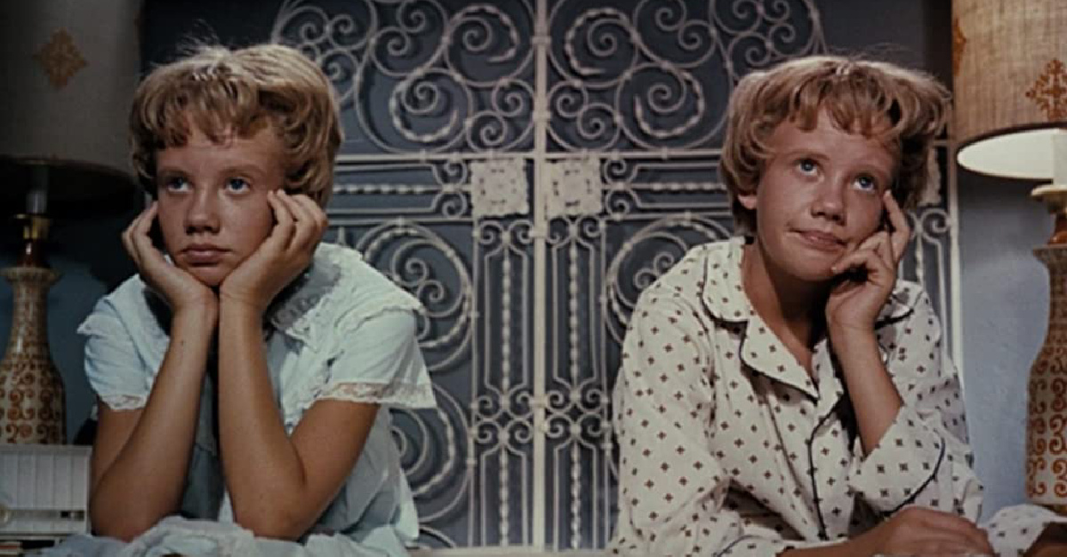 Two identical young girls looking frustrated, The Parent Trap