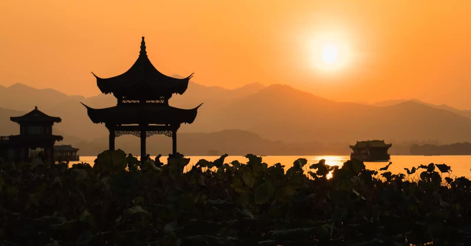 Silhouette of a Chinese building at sunset