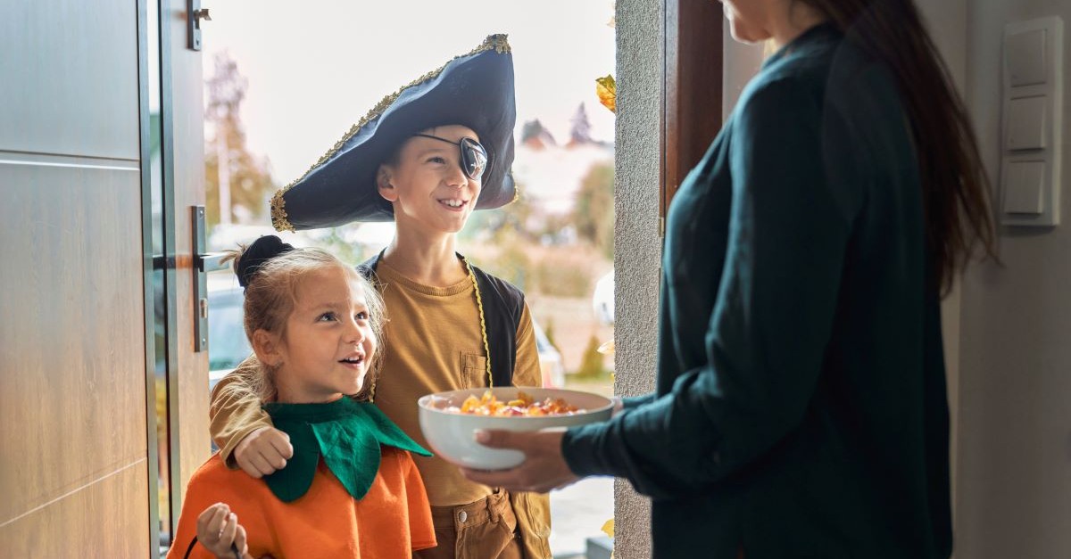 halloween trick or treat handing out candy fall autumn neighbor