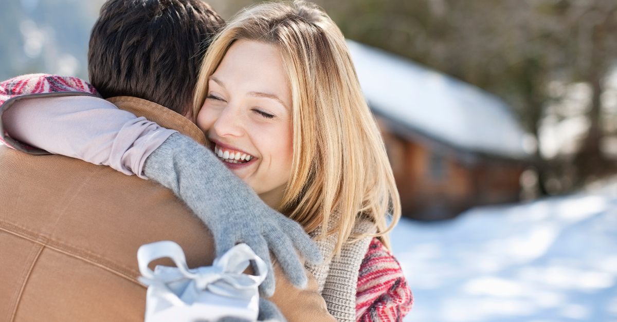 Husband giving his wife a gift