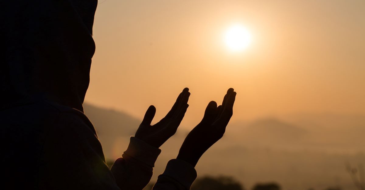 woman worshipping worship sunset sunrise hands up canaanite woman