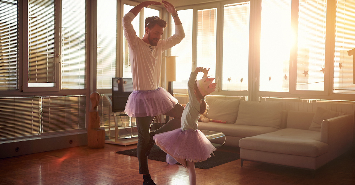 Father dancing with daughter