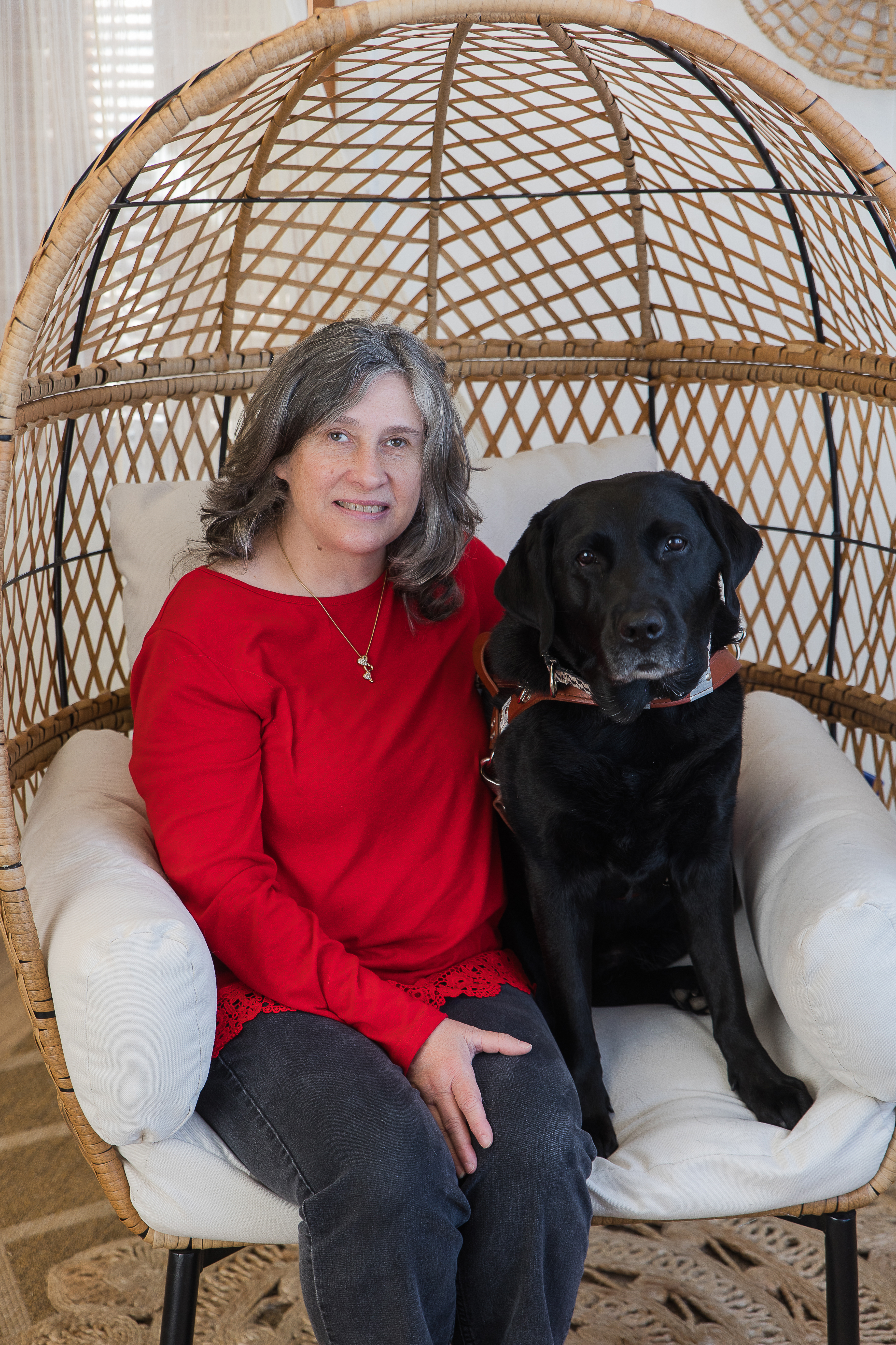 Carolyn Dale Newell headshot with dog