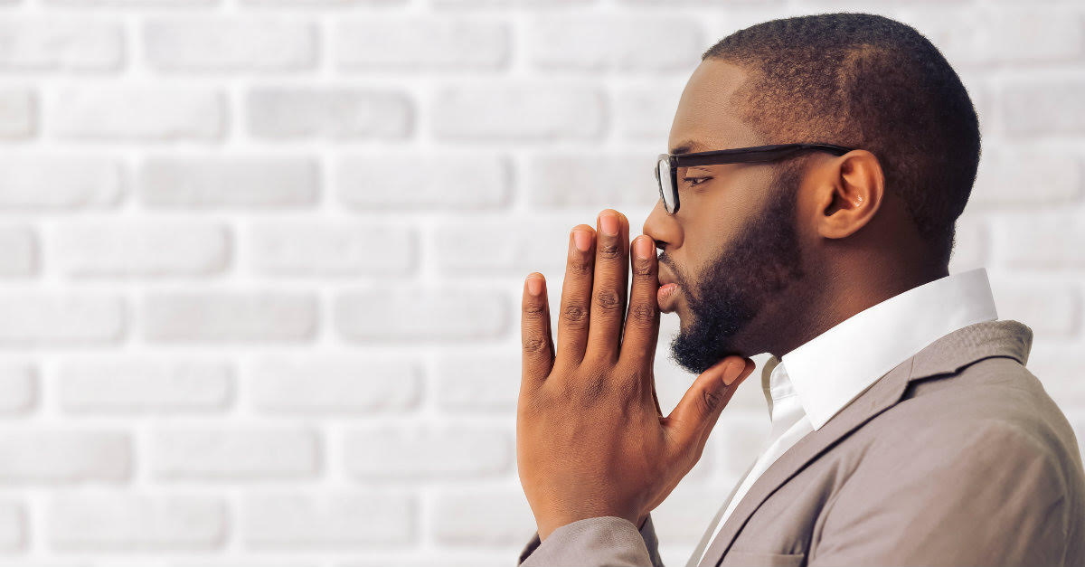 man in deep thought and prayer